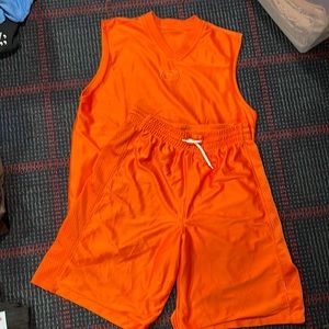 Basketball reversible top (mesh fabric on reverse) & matching shorts.  Orange.